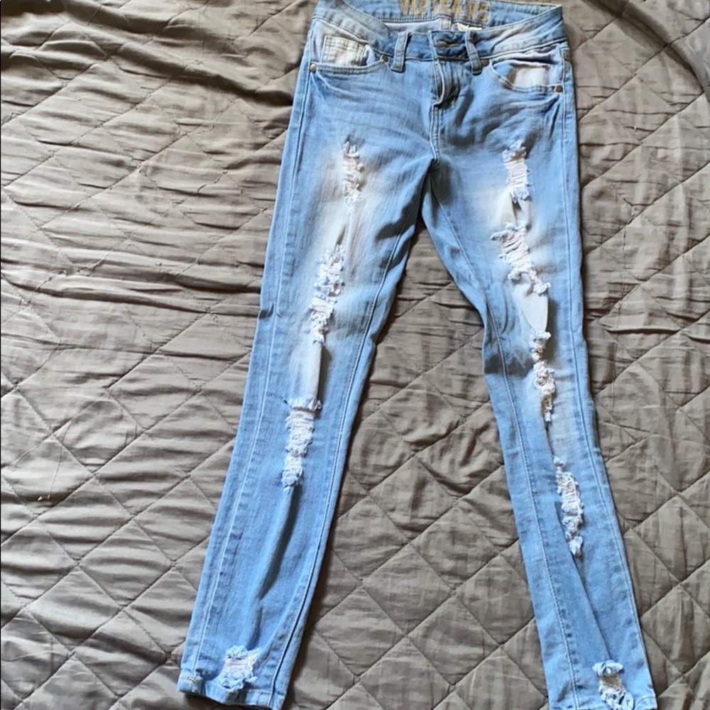 Light blue ripped jeans